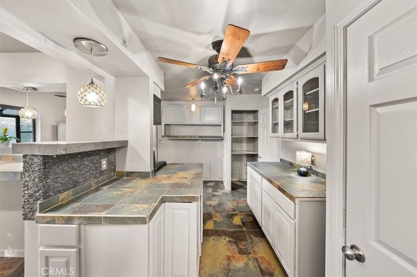 Interior, Kitchen, Pendant Lights, Stainless Steel Appliances, Tile Countertops
