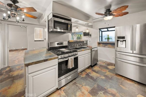 Interior, Kitchen, Stainless Steel Appliances, Tile Countertops
