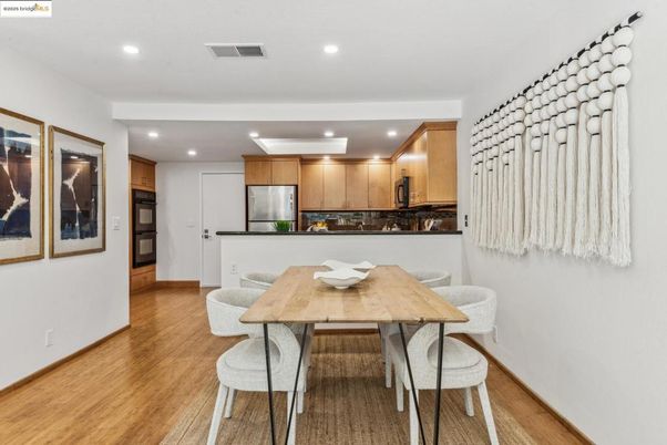 Dining room, Interior, Kitchen, Recessed Lighting, Stainless Steel Appliances, Wood Texture Flooring