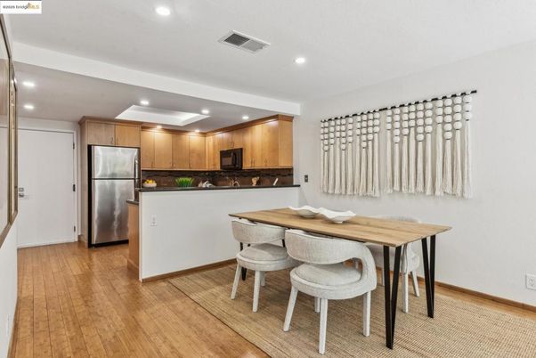 Dining room, Interior, Kitchen, Recessed Lighting, Stainless Steel Appliances, Wood Texture Flooring