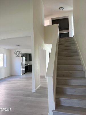 Chandelier, Interior, Kitchen, Pendant Lights, Stainless Steel Appliances, Wood Texture Flooring