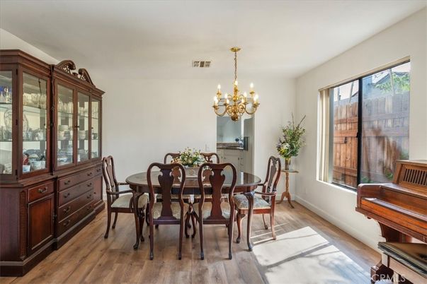 Chandelier, Dining room, Interior, Piano, Wood Texture Flooring