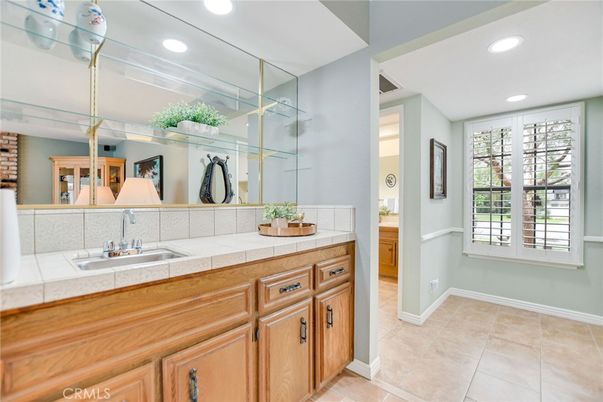 Bathroom, Dual Sink Vanities, Interior, Recessed Lighting, Tile Countertops