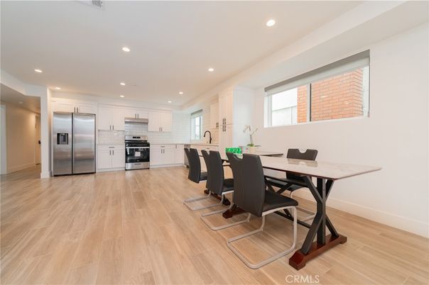 Dining room, Interior, Kitchen, Recessed Lighting, Stainless Steel Appliances, Wood Texture Flooring