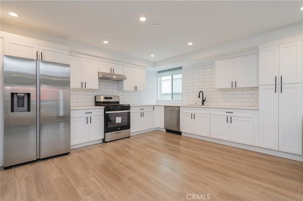 Interior, Kitchen, Recessed Lighting, Stainless Steel Appliances, Wood Texture Flooring