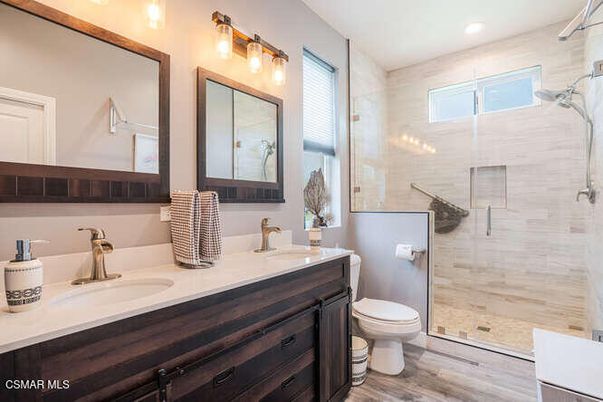 Bathroom, Dual Sink Vanities, Glass Shower, Interior, Recessed Lighting, Wood Texture Flooring