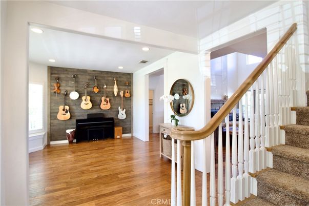 Interior, Piano, Recessed Lighting, Stone Walls, Wood Texture Flooring