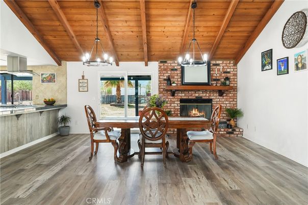 Dining room, Fireplace, Interior, Pendant Lights, Stone Walls, Wooden Beams, Wooden Ceilings, Wood Texture Flooring