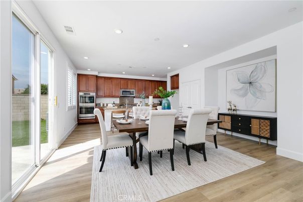 Dining room, Interior, Kitchen, Recessed Lighting, Stainless Steel Appliances, Wood Texture Flooring