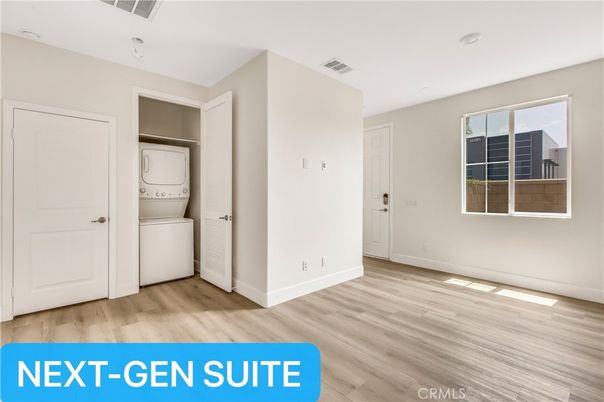 Empty room, Interior, Recessed Lighting, Utility Closets, Washer, Wood Texture Flooring