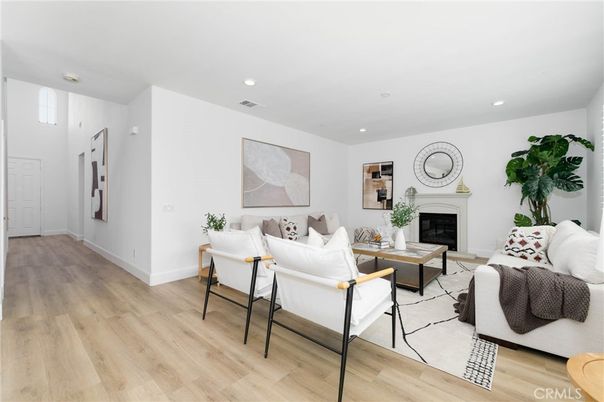Fireplace, Interior, Living room, Recessed Lighting, Wood Texture Flooring