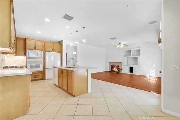 Fireplace, Interior, Kitchen, Pendant Lights, Recessed Lighting, Wood Texture Flooring