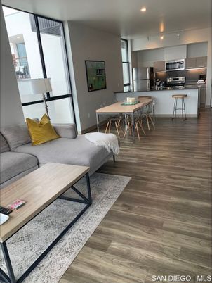 Dining room, Interior, Kitchen, Living room, Recessed Lighting, Stainless Steel Appliances, Wood Texture Flooring