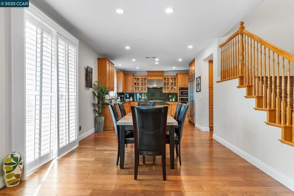 Dining room, Interior, Kitchen, Recessed Lighting, Stainless Steel Appliances, Wood Texture Flooring