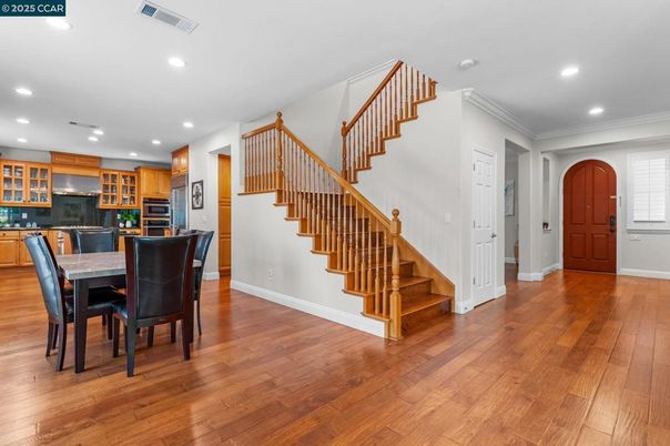 Dining room, Interior, Kitchen, Recessed Lighting, Stainless Steel Appliances, Wood Texture Flooring