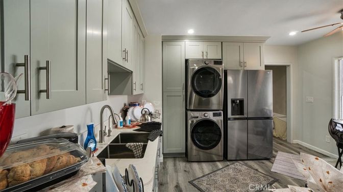 Interior, Kitchen, Recessed Lighting, Washer, Wood Texture Flooring