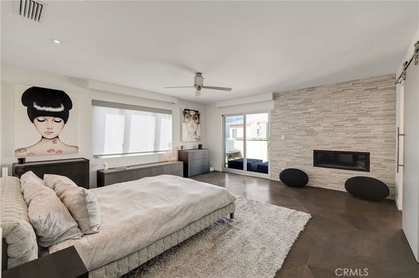Bedroom, Fireplace, Interior, Recessed Lighting, Stone Walls, Wood Texture Flooring