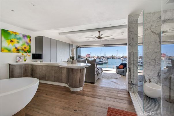 Bathroom, Free Standing Baths, Interior, Marble Walls, Water, Wood Texture Flooring