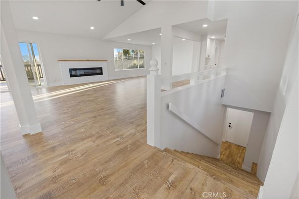 Empty room, Fireplace, Interior, Recessed Lighting, Wood Texture Flooring