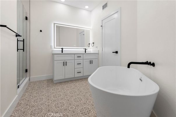 Bathroom, Dual Sink Vanities, Free Standing Baths, Interior, Recessed Lighting