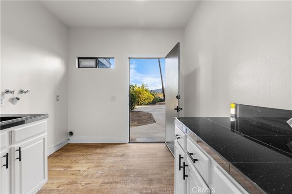 Interior, Kitchen, Tile Countertops, Wood Texture Flooring