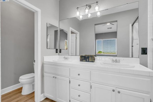 Bathroom, Dual Sink Vanities, Interior, Tile Countertops, Wood Texture Flooring
