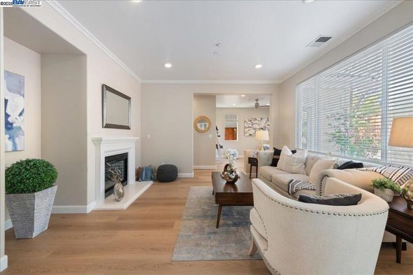 Fireplace, Interior, Living room, Piano, Recessed Lighting, Wood Texture Flooring