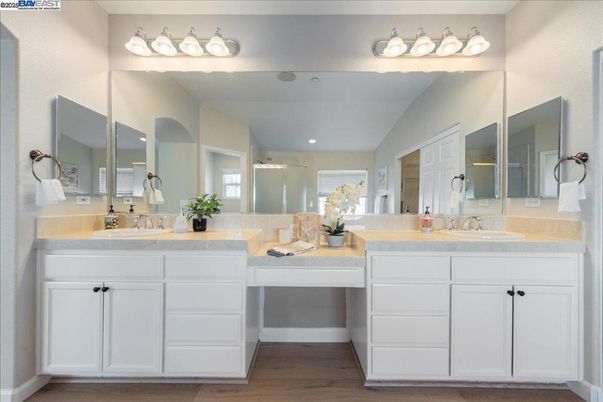 Bathroom, Dual Sink Vanities, Interior, Recessed Lighting, Wood Texture Flooring