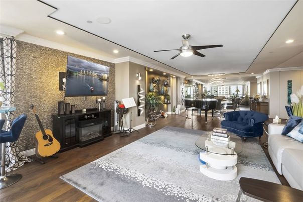 Dining room, Fireplace, Interior, Living room, Recessed Lighting, Wood Texture Flooring