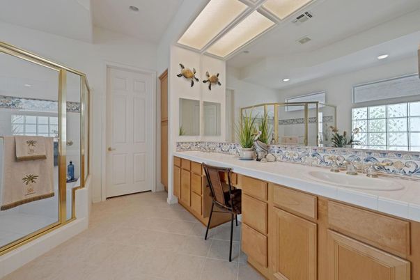 Bathroom, Dual Sink Vanities, Glass Shower, Interior, Recessed Lighting, Tile Countertops