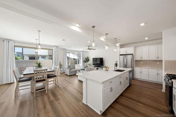 Dining room, Interior, Kitchen, Living room, Pendant Lights, Recessed Lighting, Stainless Steel Appliances, Wood Texture Flooring