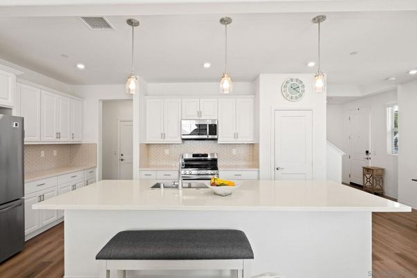 Interior, Kitchen, Pendant Lights, Recessed Lighting, Stainless Steel Appliances, Wood Texture Flooring