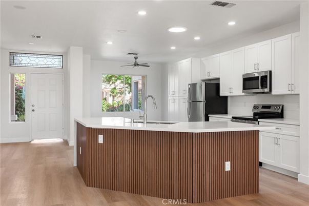Interior, Kitchen, Recessed Lighting, Stainless Steel Appliances, Wood Texture Flooring