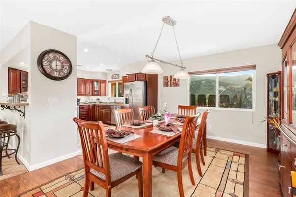 Dining room, Interior, Kitchen, Pendant Lights, Recessed Lighting, Stainless Steel Appliances, Wood Texture Flooring