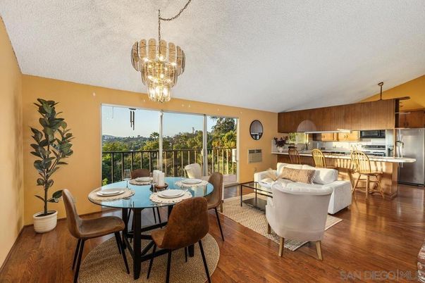 Chandelier, Dining room, Interior, Kitchen, Living room, Stainless Steel Appliances, Wood Texture Flooring