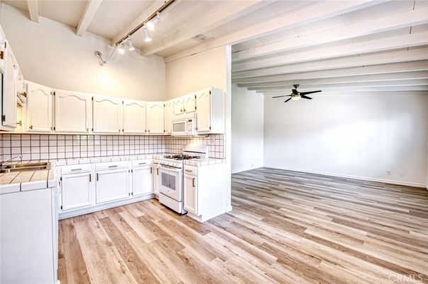 Interior, Kitchen, Tile Countertops, Wood Texture Flooring