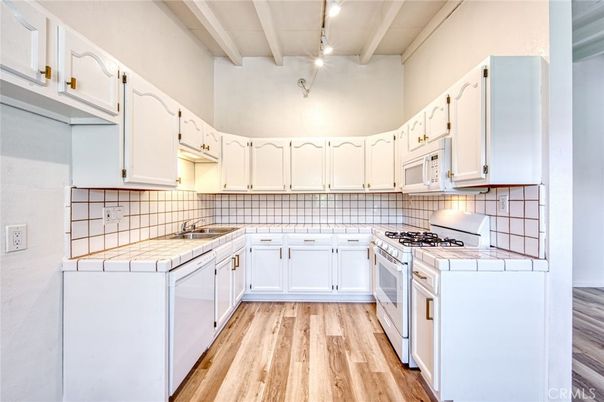 Interior, Kitchen, Tile Countertops, Wood Texture Flooring
