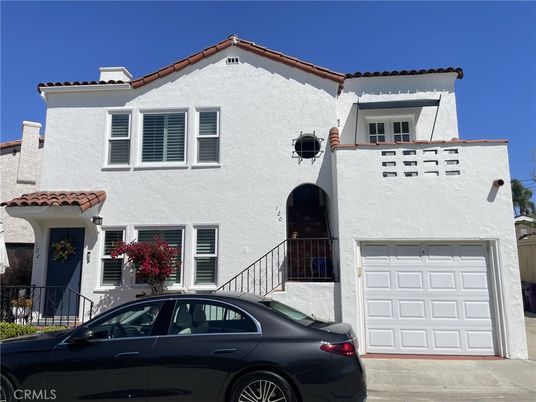 Attached, Exterior, Facade, Spanish Mediterranean