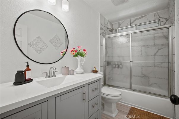 Bathroom, Glass Shower, Interior, Marble Walls, Wood Texture Flooring