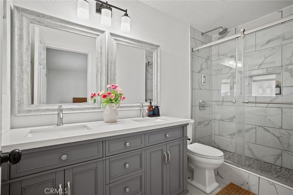 Bathroom, Dual Sink Vanities, Glass Shower, Interior, Marble Walls