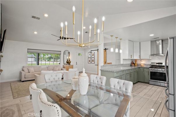 Dining room, Interior, Kitchen, Living room, Pendant Lights, Recessed Lighting, Stainless Steel Appliances, Wood Texture Flooring