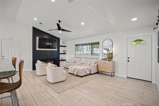Bedroom, Fireplace, Interior, Living room, Recessed Lighting, Wood Texture Flooring