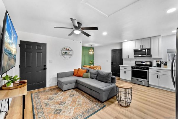 Dining room, Interior, Kitchen, Living room, Pendant Lights, Recessed Lighting, Stainless Steel Appliances, Wood Texture Flooring