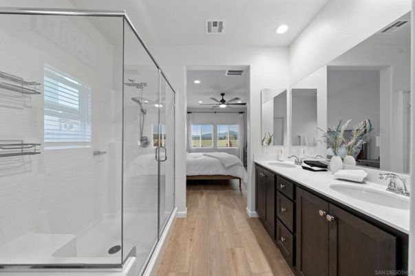 Bathroom, Bedroom, Dual Sink Vanities, Glass Shower, Interior, Recessed Lighting, Wood Texture Flooring