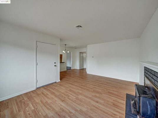 Empty room, Fireplace, Interior, Pendant Lights, Wood Texture Flooring
