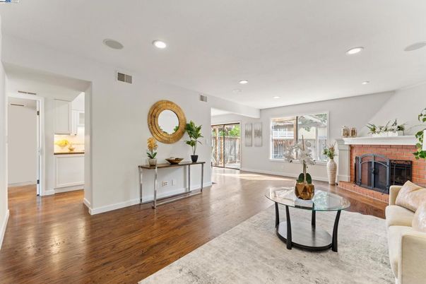 Fireplace, Interior, Living room, Recessed Lighting, Wood Texture Flooring