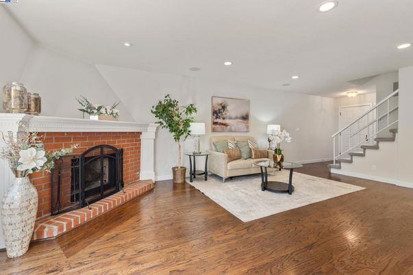 Fireplace, Interior, Living room, Recessed Lighting, Wood Texture Flooring