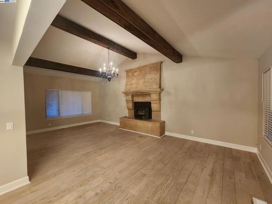 Chandelier, Empty room, Fireplace, Interior, Wooden Beams, Wood Texture Flooring