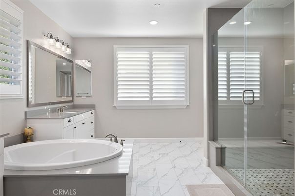 Bathroom, Dual Sink Vanities, Glass Shower, Interior, Marble, Recessed Lighting
