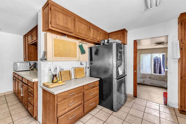 Interior, Kitchen, Tile Countertops, Wood Texture Flooring